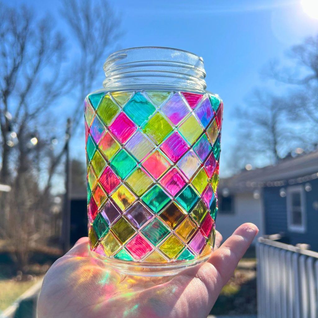 colorful sharpie stained glass jar in the sun