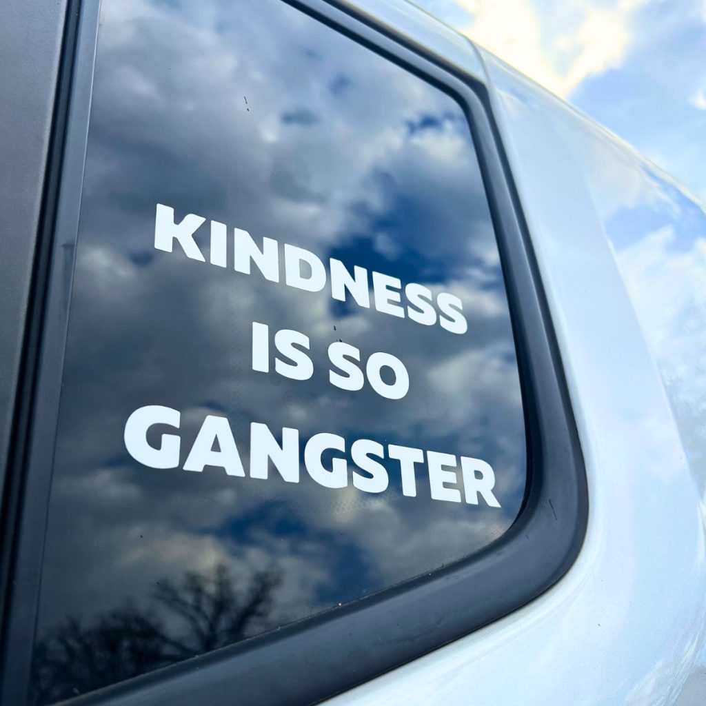 car decal on a cloudy day kindness is so gangster