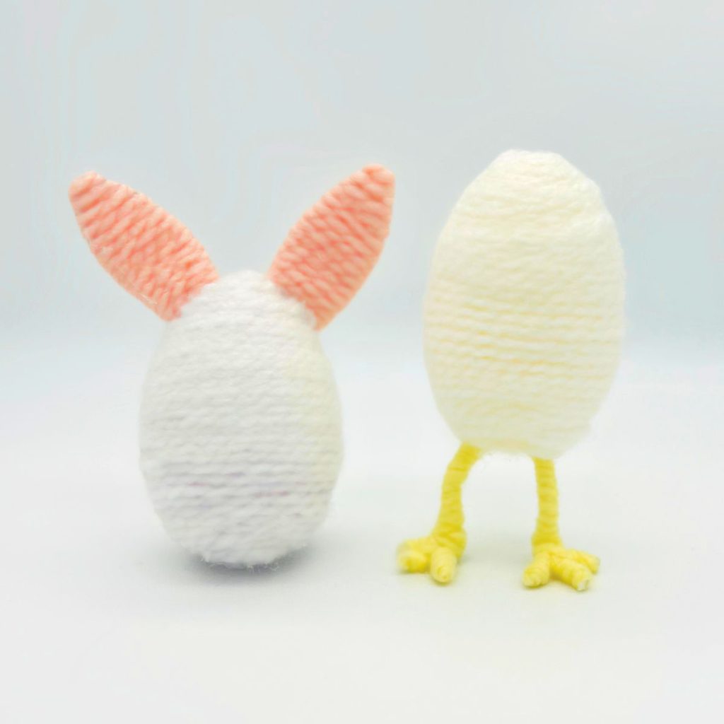 bunny ears sticking out of egg wrapped in yarn chick legs sticking out of egg bunny and chick from plastic easter eggs