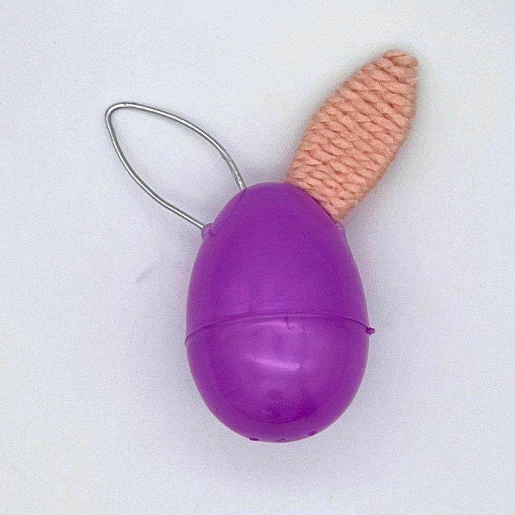 purple plastic easter egg wire ear and pink byunny ear